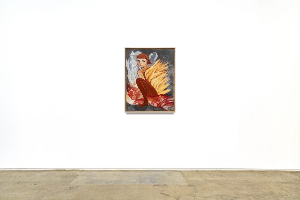 a painting of a woman in red with flames coming off her body on a white gallery wall