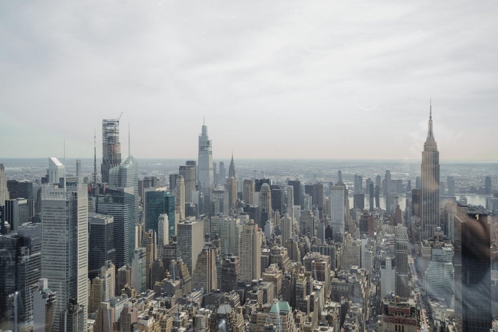 A view of Manhattan from 66 stories up, including the Empire State Building.