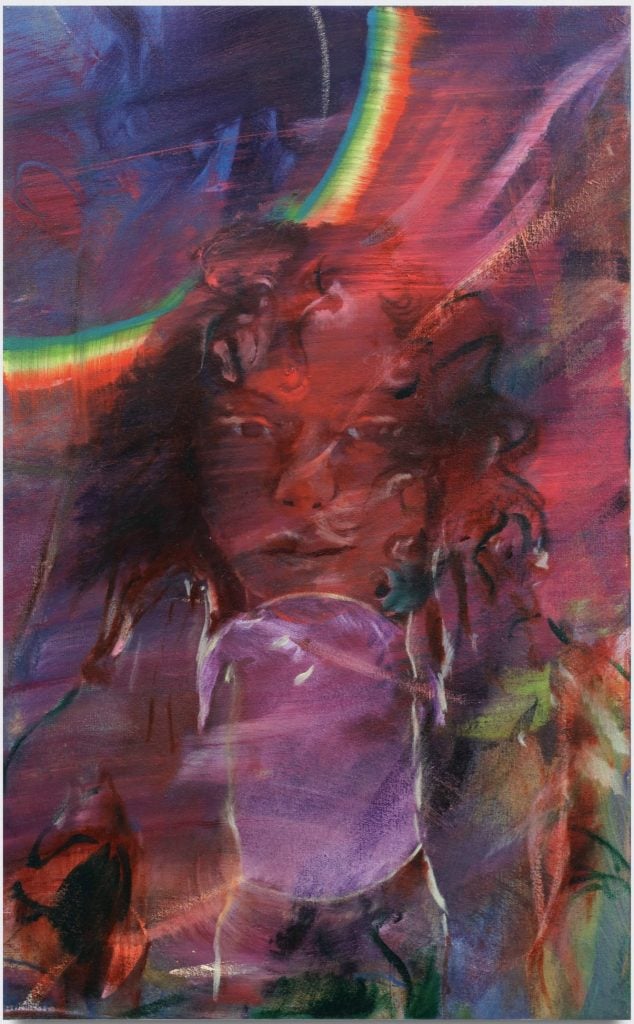A photograph of a colorful, semi-abstract painting centered on a girl's face