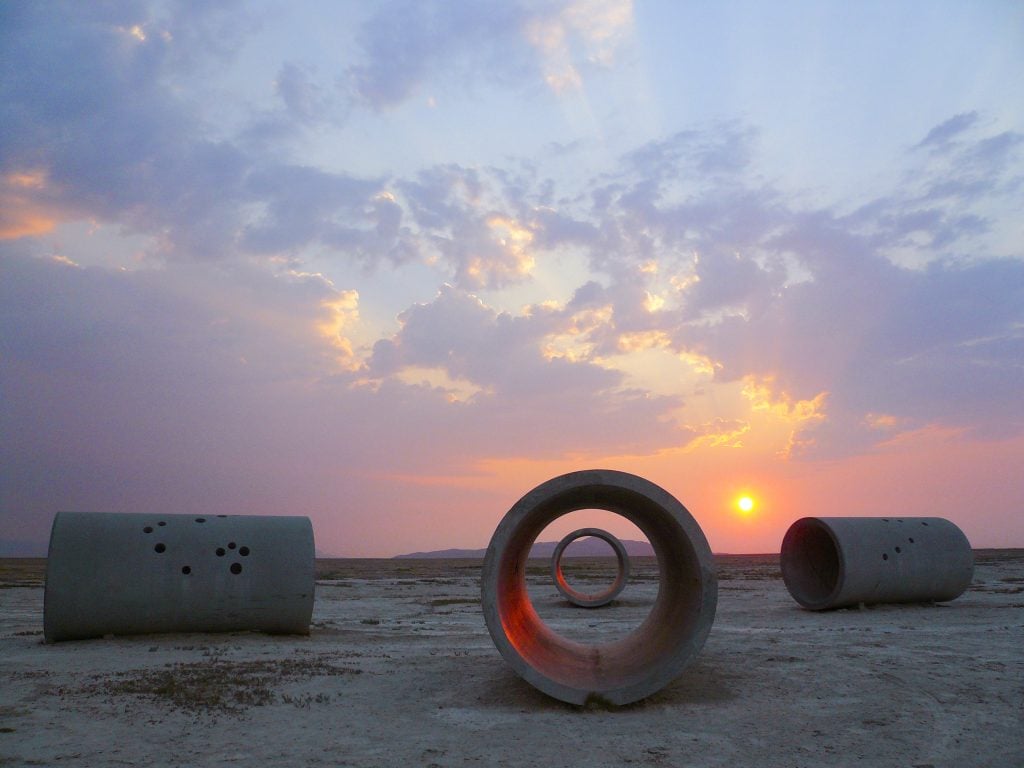 Each of Nancy Holt's Sun Tunnels (1973-76) has a different configuration of holes corresponding to stars in four constellations: Draco, Perseus, Columba, and Capricorn. Nancy Holt, Sun Tunnels (1973–76), Great Basin Desert, Utah. © Holt/Smithson Foundation and Dia Art Foundation/Licensed by VAGA at Artists Rights Society (ARS), New York, photo: ZCZ Films/James Fox, courtesy Holt/Smithson Foundation. 