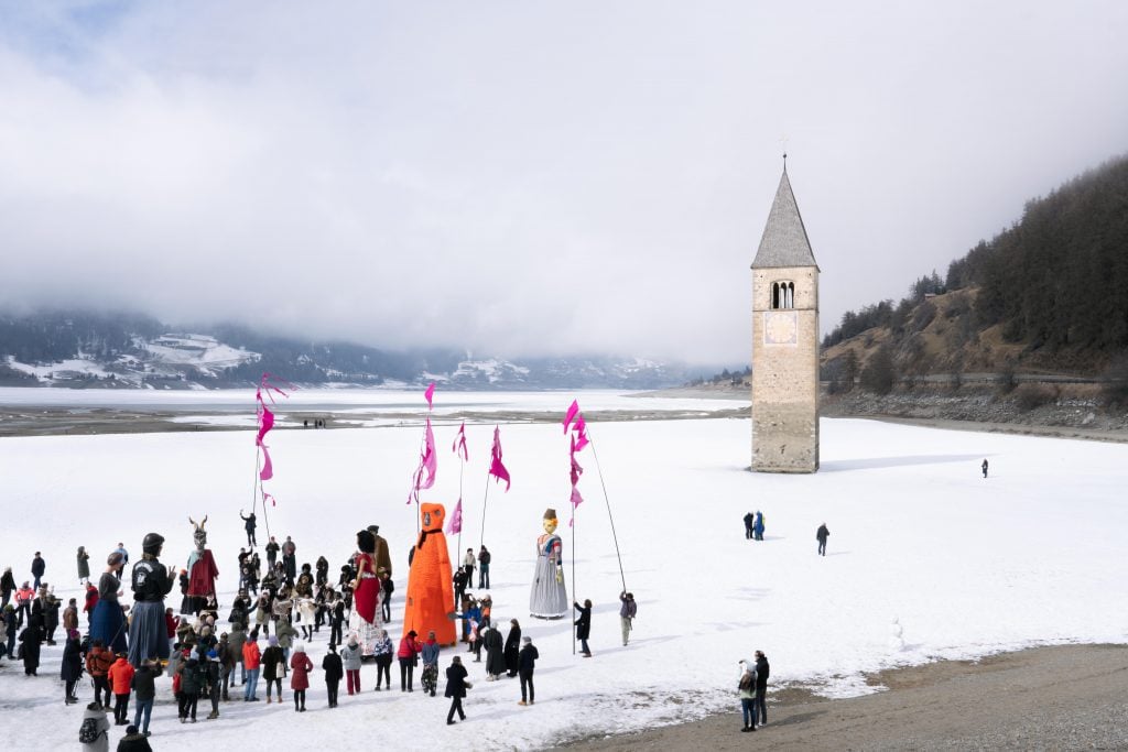 Picnic party at Lago di Resia, Petticoat Government, Belgian Pavilion for La Biennale di Venezia, 9 March 2024.Courtesy Petticoat government (Denicolai & Provoost · AntoinetteJattiot · Nord · Speculoos) Image Lola Pertsowsky.