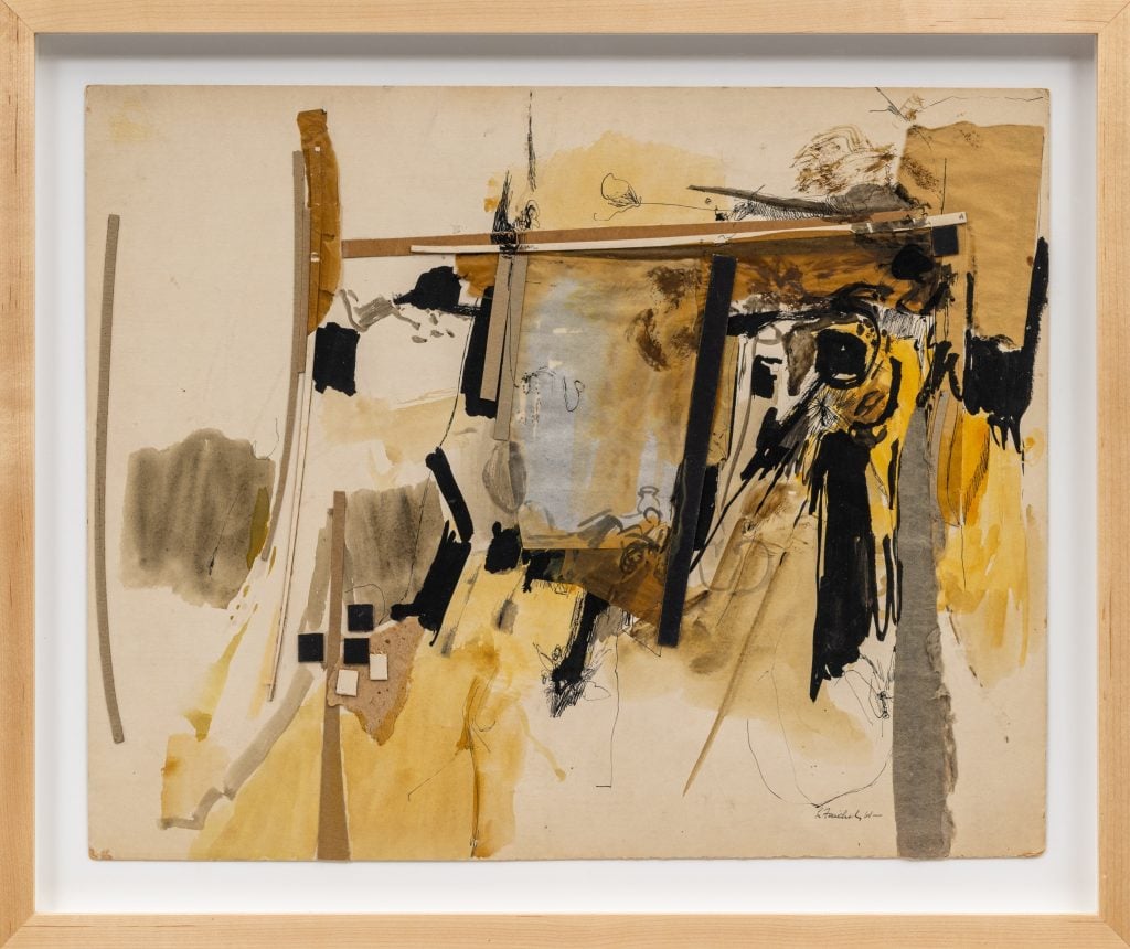 an abstract collage on paper in shades of brown, yellow, grey and black