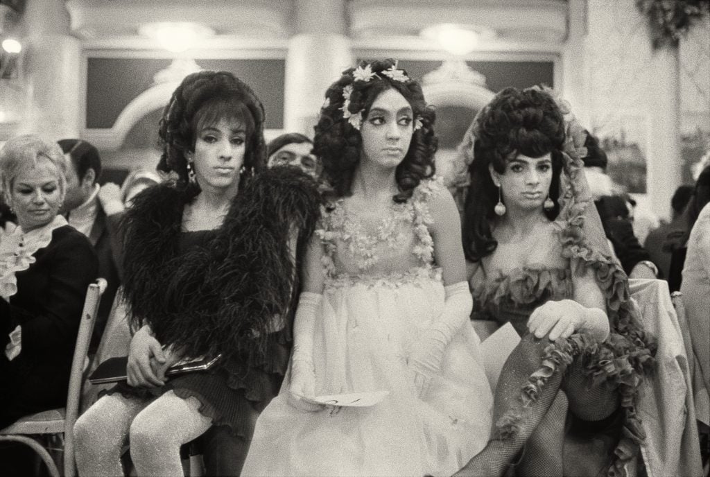 Black and white photograph of three drag queens 