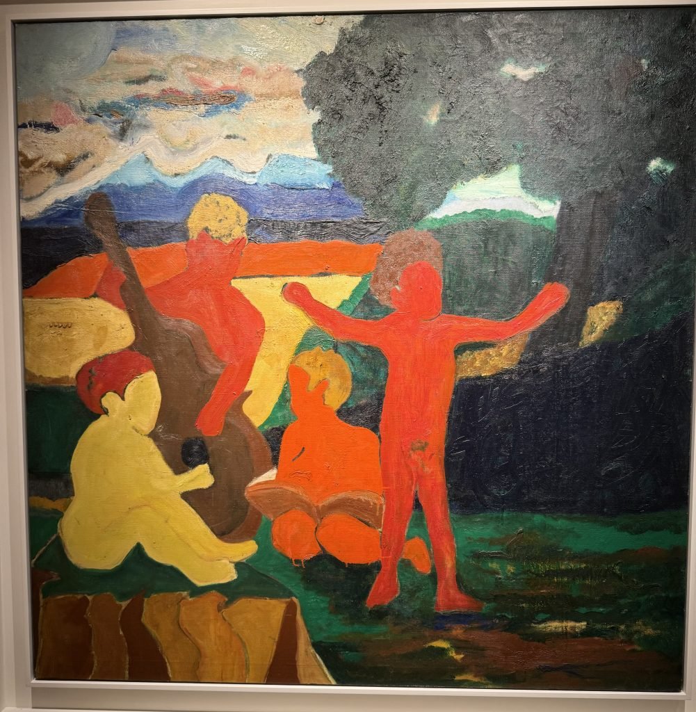 A vibrantly colored painting shows red, orange, and yellow figures in a landscape.
