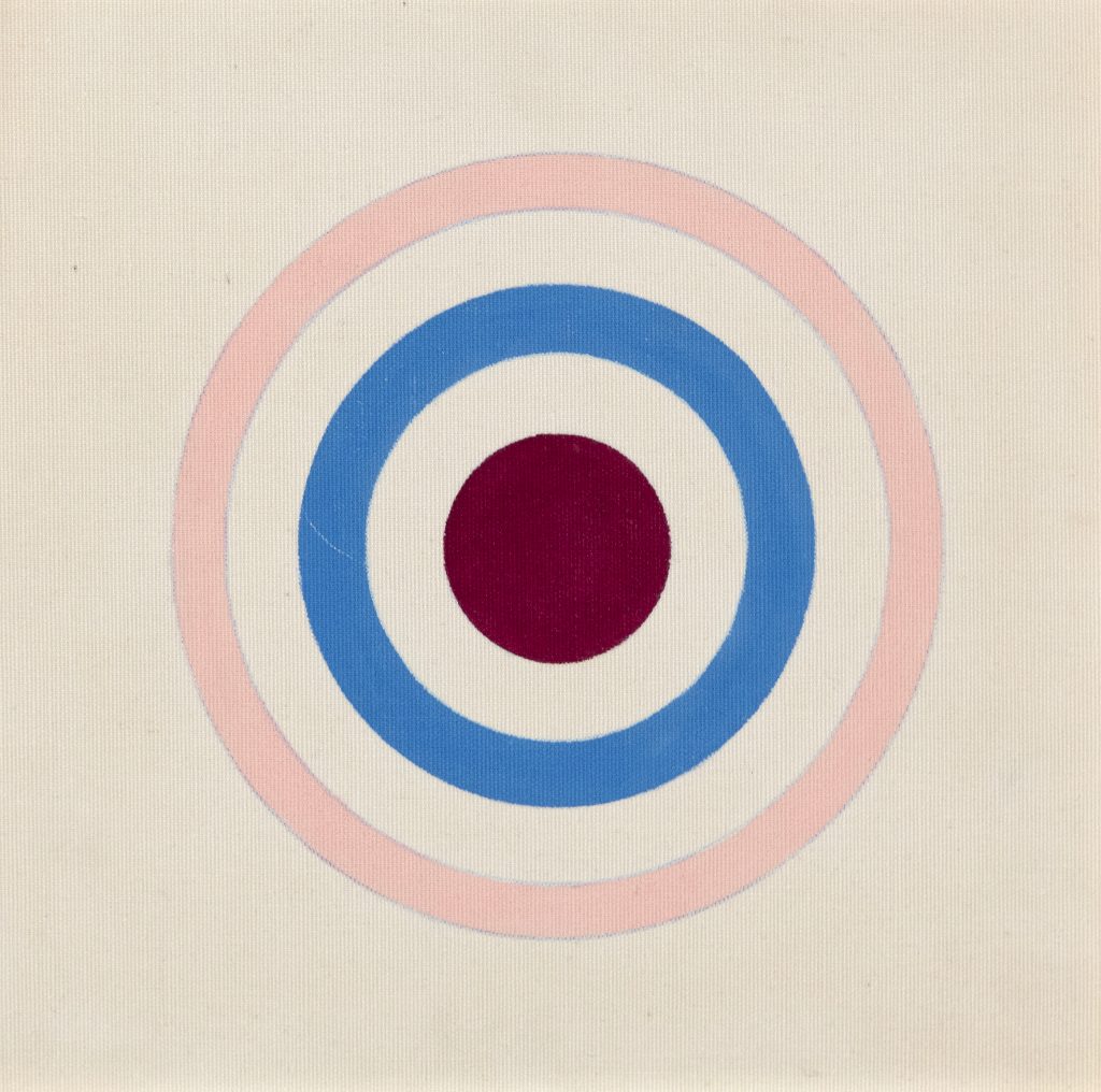 A Kenneth Noland circle composition with a maroon dot in the center and two concentric bands, the interior being blue and exterior in pale pink on a beige paper ground.