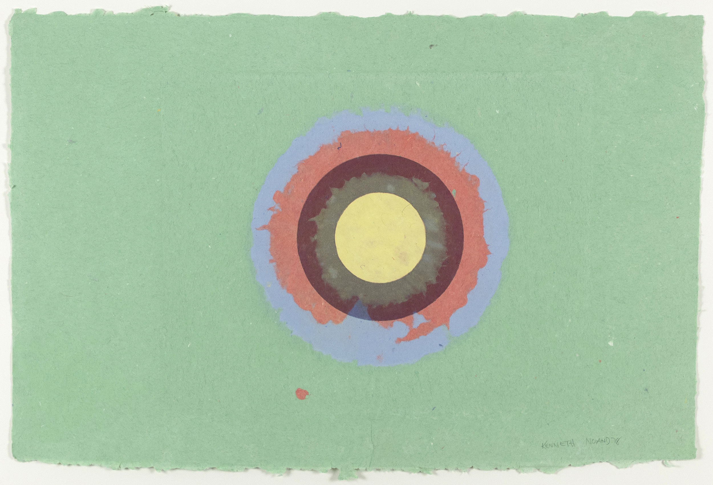 A Kenneth Noland circle composition on paper, with the circles in pink, umber, and yellow on a sea foam ground.