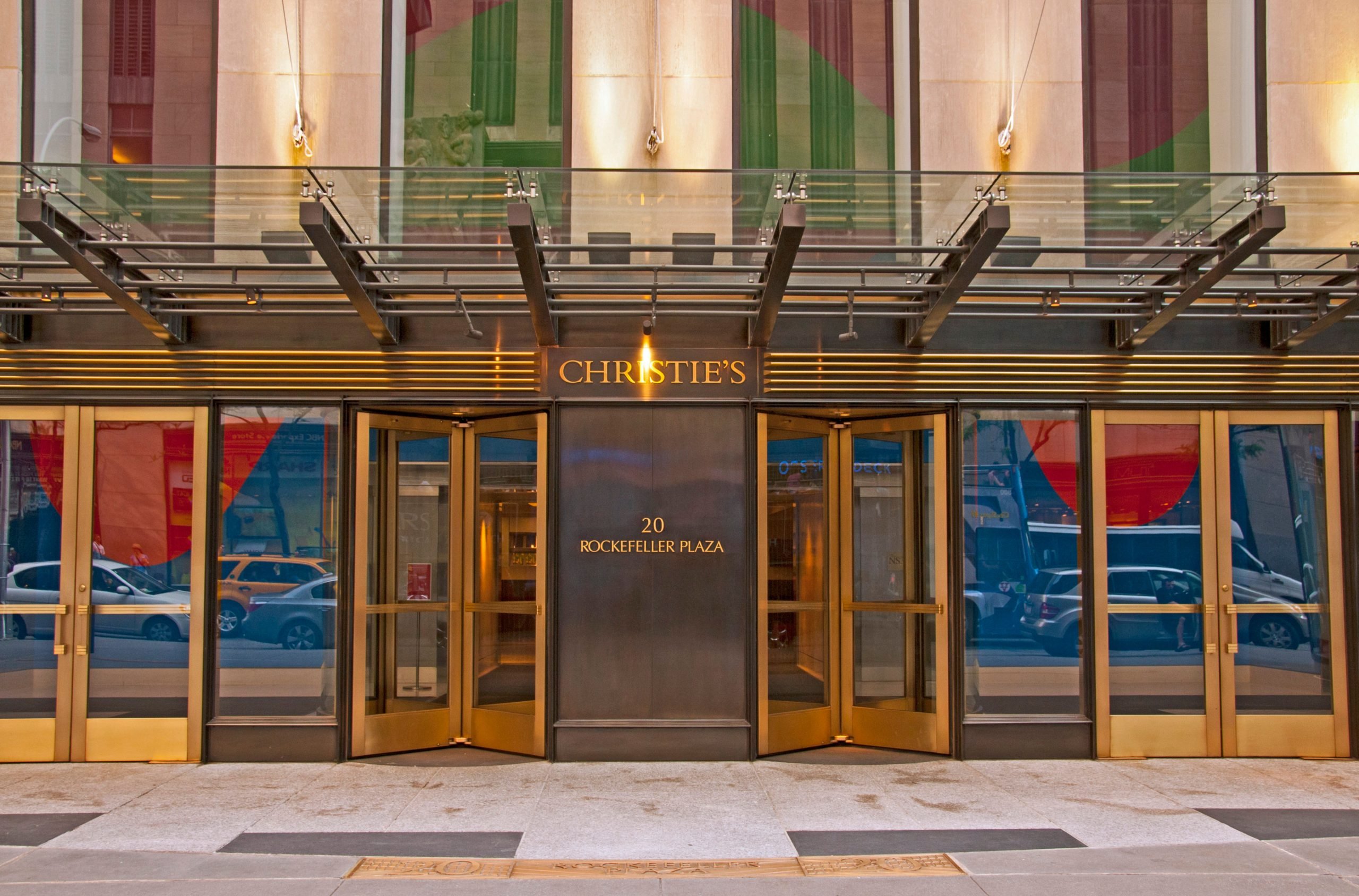 An ornate entrance to a building that reads "Christie's"