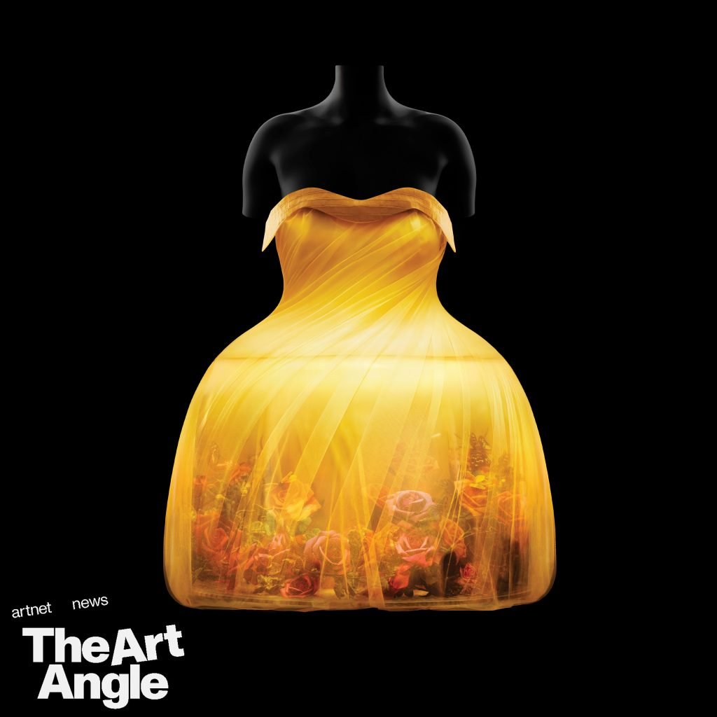 a three-dimensional yellow dress appears to be backlit with a terrarium inside of the skirt