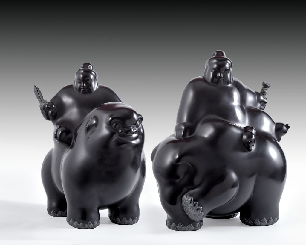 Two bronze sculptures of figures riding on animals in the Cowley Abbott sale.