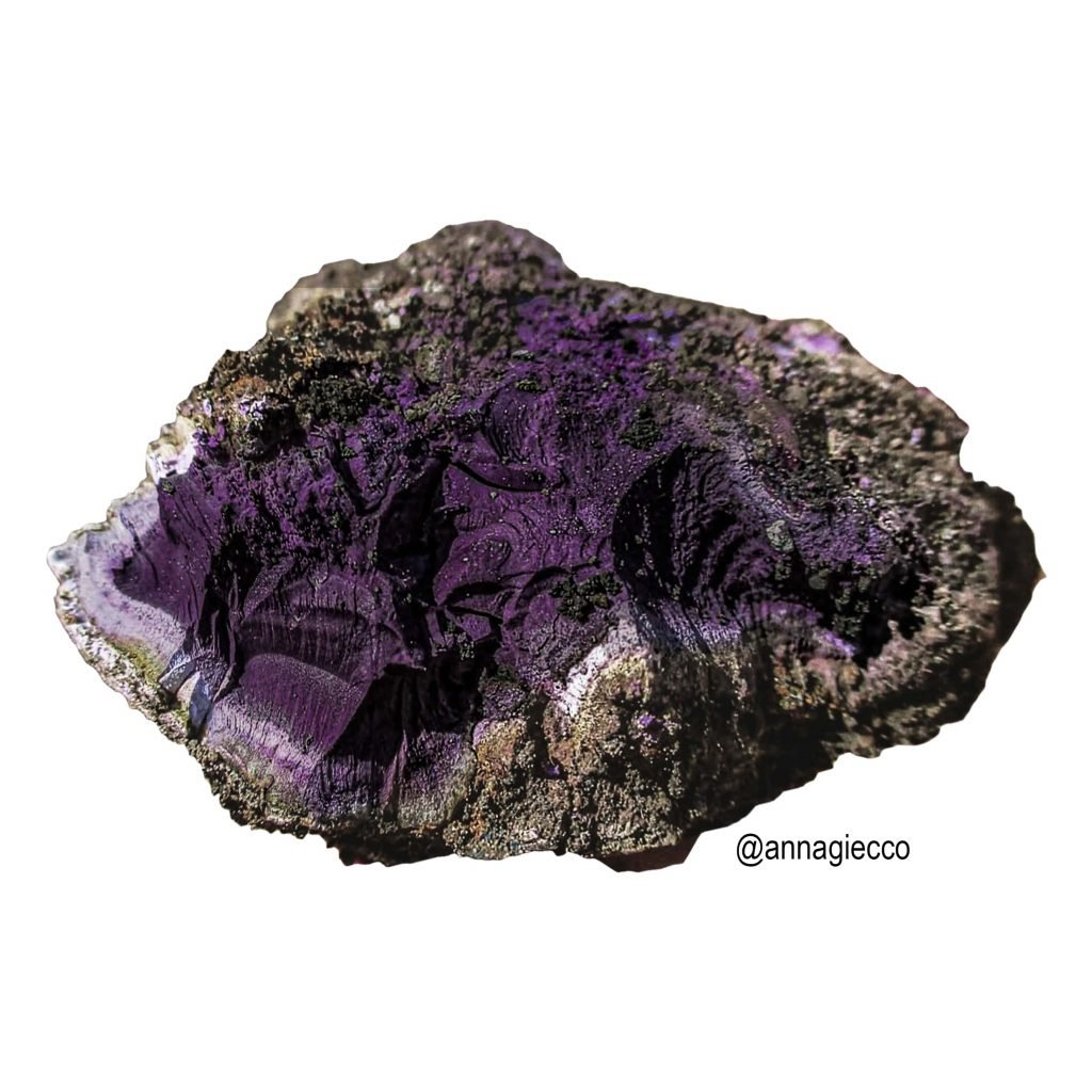A lump of rock stained purple