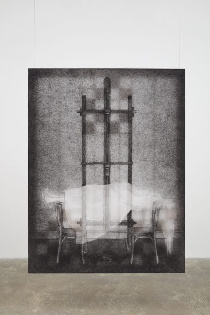 a moody black and white art work showing a girl levitating over two chairs