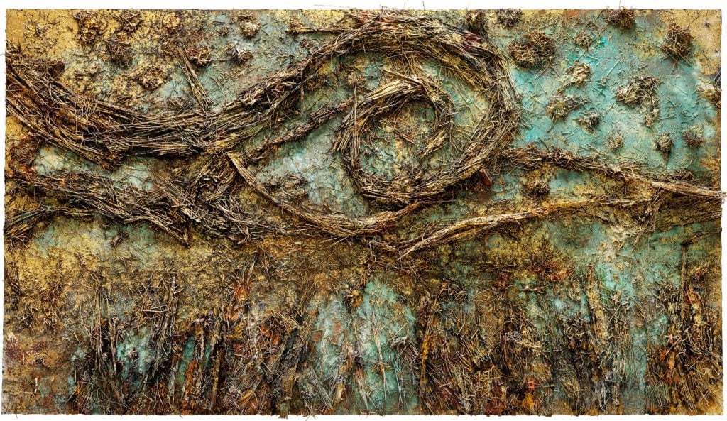 Anselm Kiefer's painting, The Starry Night, with straw curled up across a pastel green canvas to mimic the swirls in Vincent Van Gogh's own Starry Night painting.