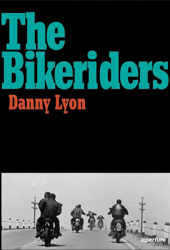 A book titled The Bikeriders, with a black-and-white image of bikers riding on a road