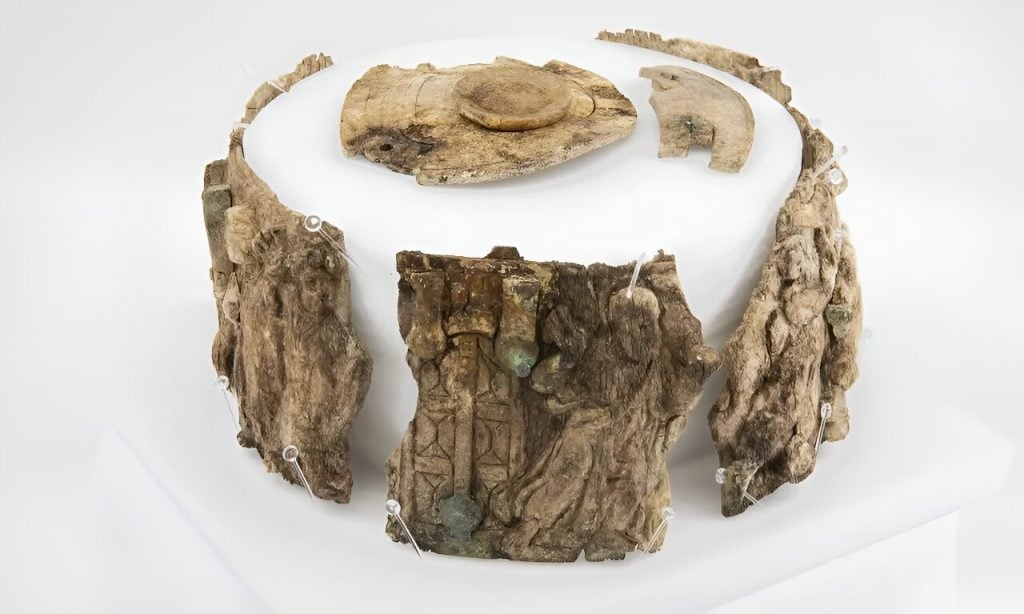 Ancient ivory fragments arranged in a circle