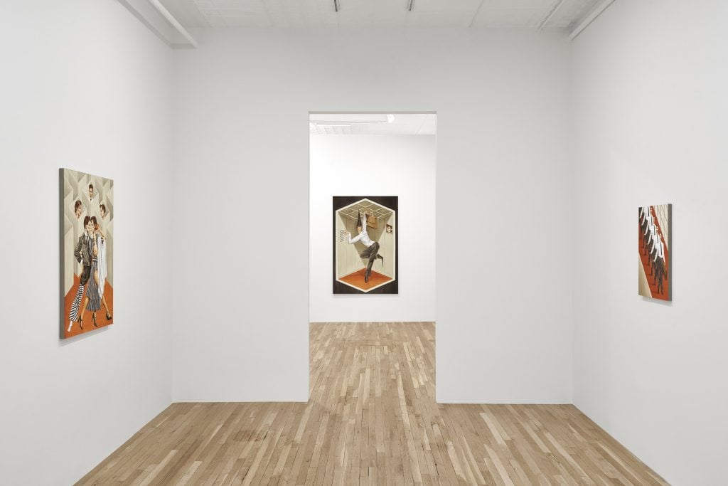 photograph of 3 paintings hanging on white walls
