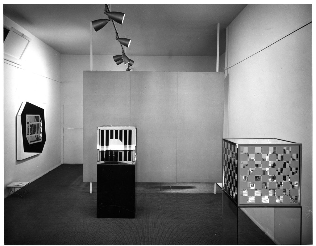 black and white photograph of larry bell cube installation