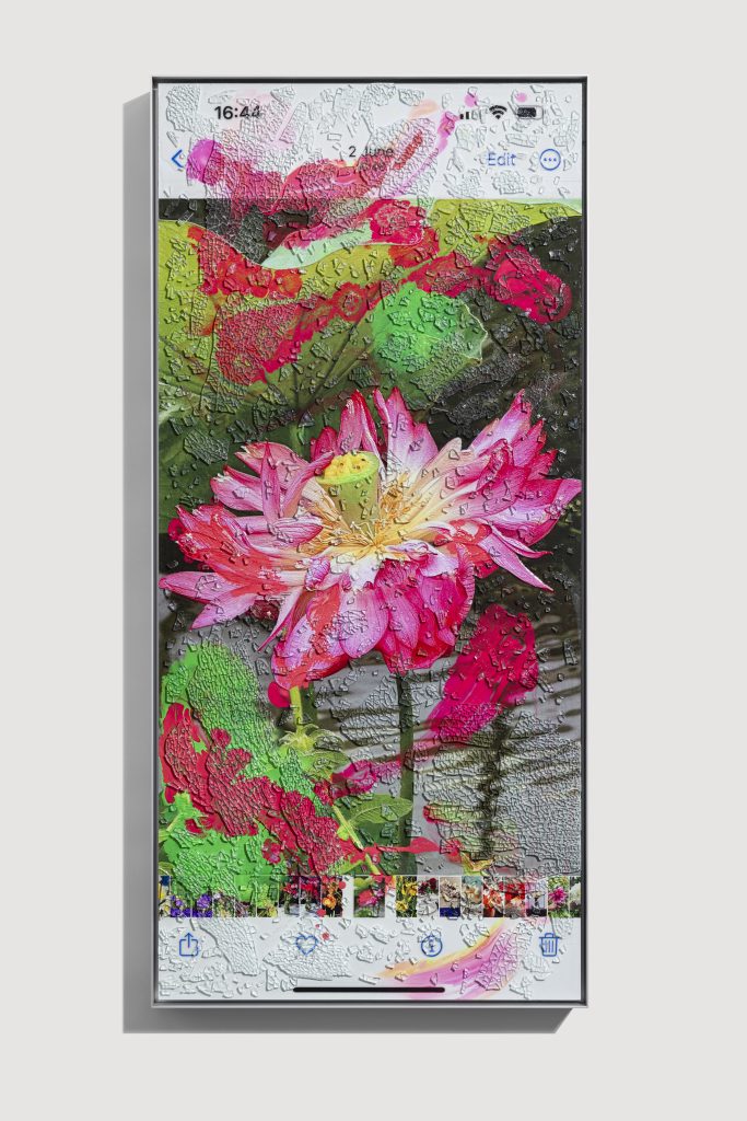 View of limited edition print by marc quinn framed in steel frame, featuring a screenshot view on an iphone of a lotus flower that is obscured by gestural swathes of color and make textural through the addition of shattered windshield glass.