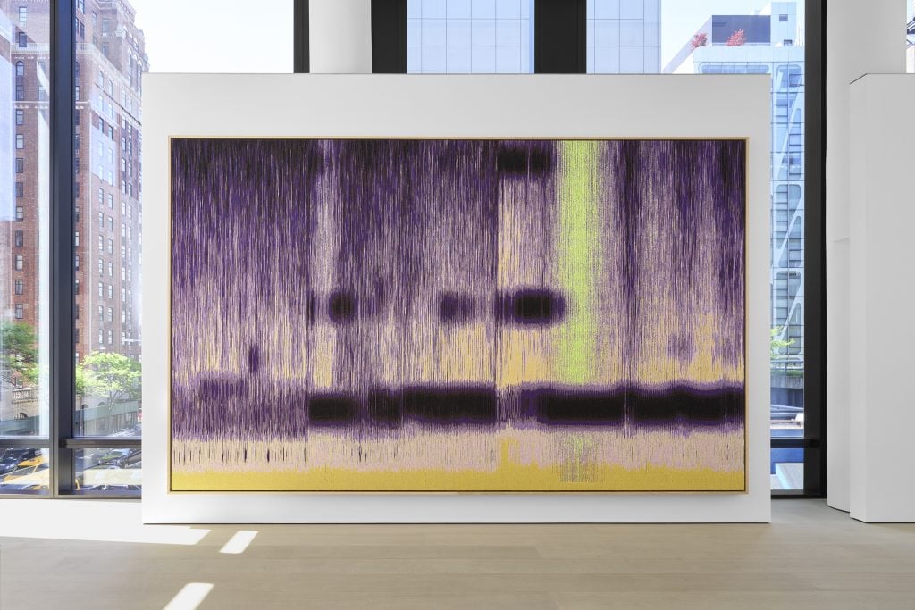 photograph of a large scale purple painting