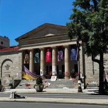 The University of the Arts building in Philadelphia covered in protest signs