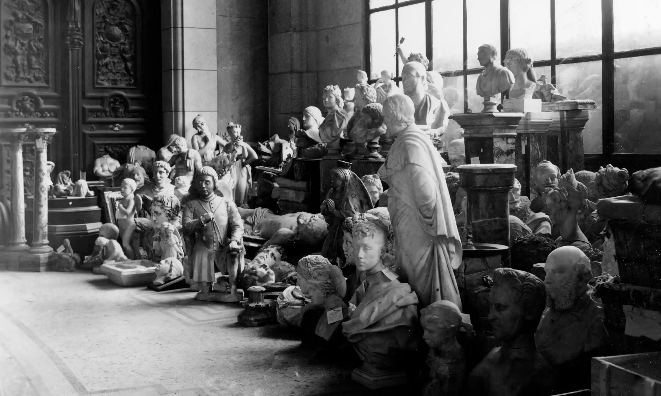 Dozens of stone statues in storage