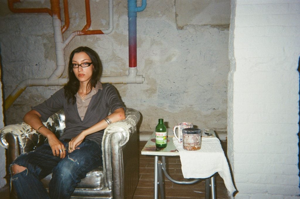 Tasneem Sarkez sits on a chair in her studio during an interview.