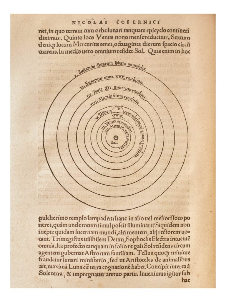 A page from Nicolaus Copernicus's De revolutionibus showing text and concentric circles