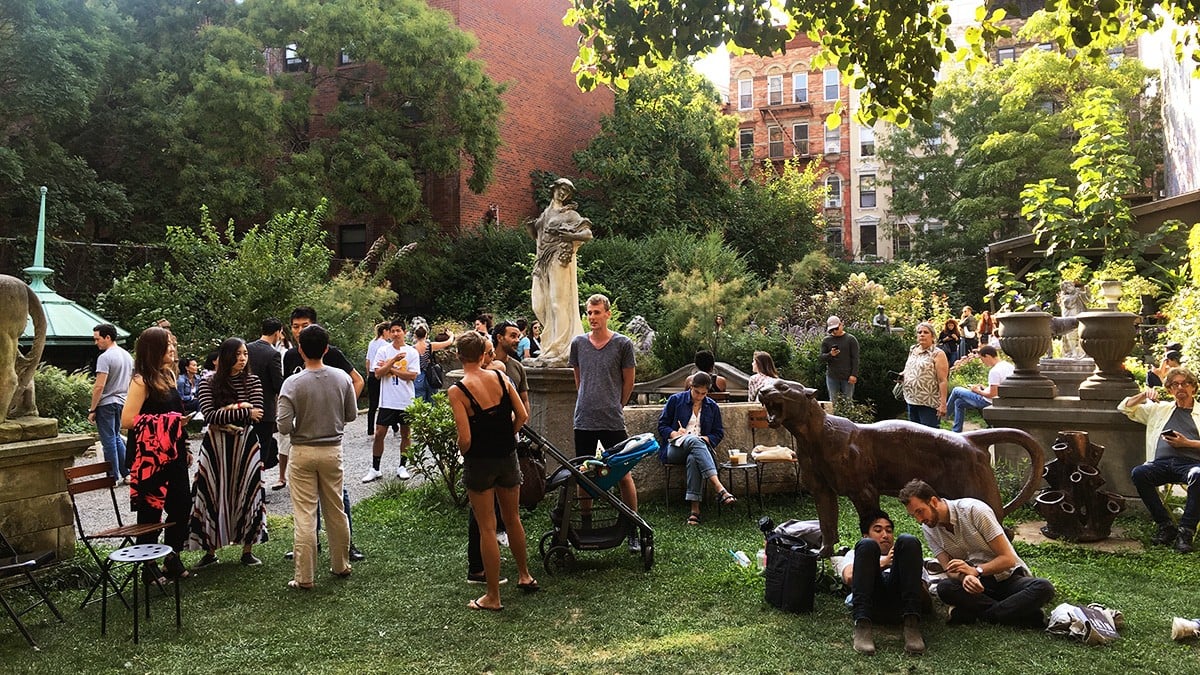 Art and visitors in the Elizabeth Street Garden. Photo courtesy of the Elizabeth Street Garden.