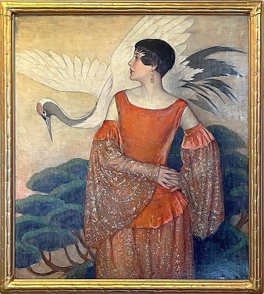 An artwork by F. Edwin Church titled "Lady in Charlotte's Dress" from 1928, rendered in oil on canvas. The painting portrays a woman in an elegant orange dress with intricate lace sleeves. She is standing in profile, gazing to the side, with a serene expression. A large white crane with outstretched wings is behind her, creating a sense of harmony between the figure and the natural elements. The background features stylized, lush greenery, enhancing the serene and sophisticated atmosphere of the composition.