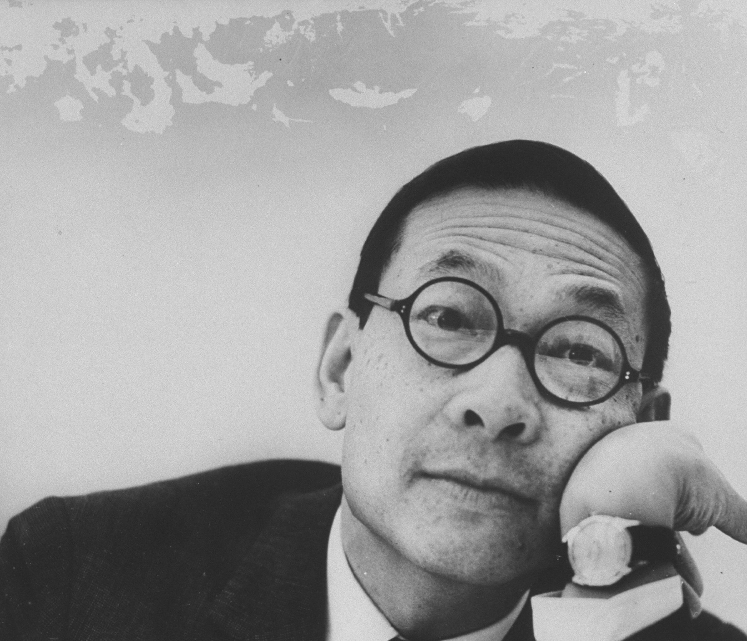 Portrait of a bespectacled East Asian man