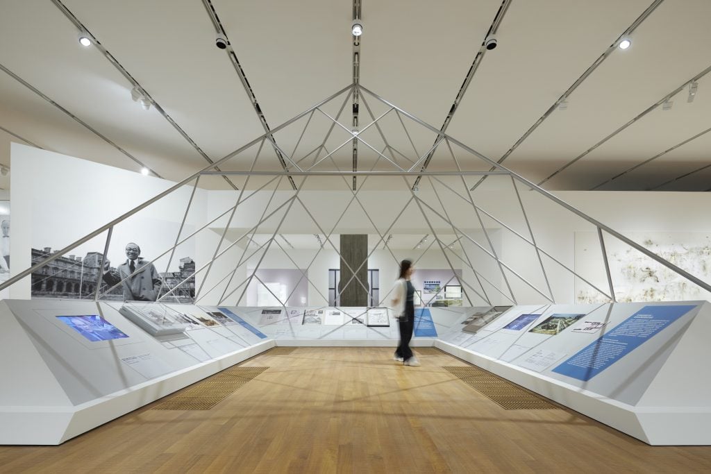 A pyramid structure in an exhibition space