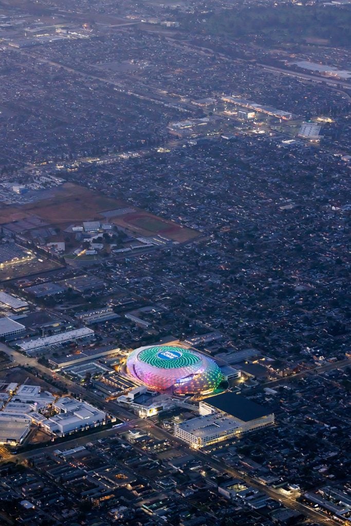 An aerial view of Jennifer Steinkamp's artwork illuminating the Intuit Dome.