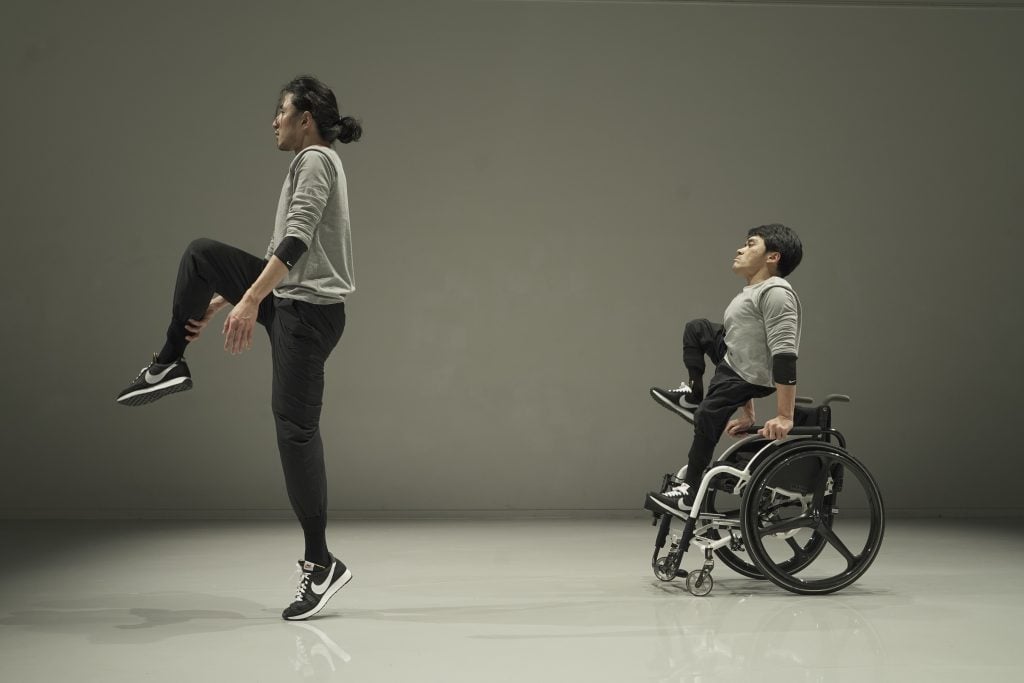 A person dancing on the left and a person on a wheel chair on the right