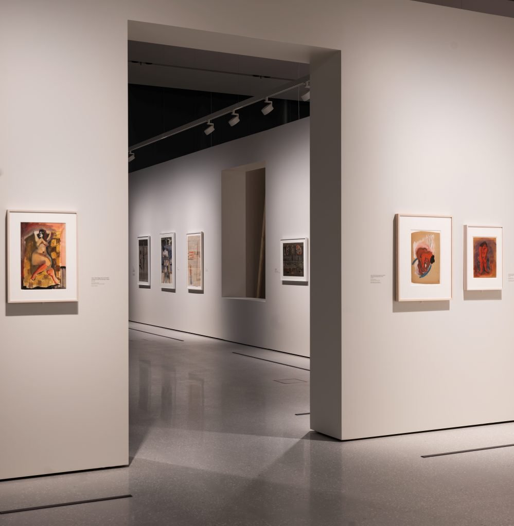 installation view of paintings on the wall 