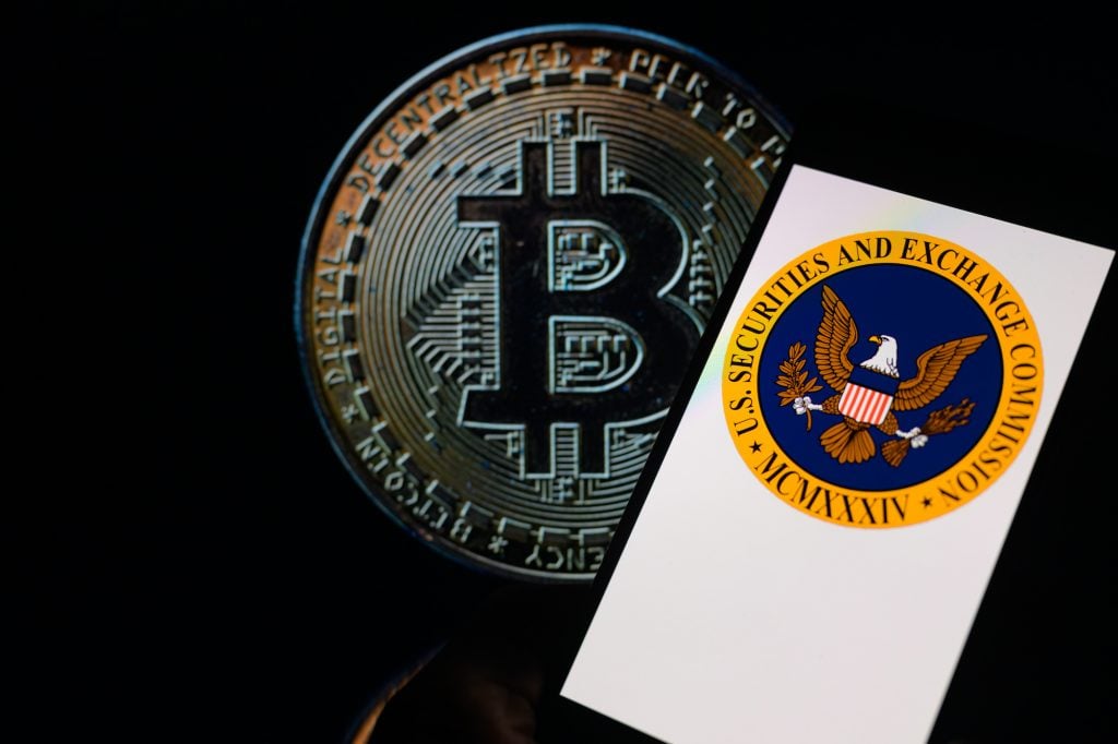 an image showing a bitcoin near the seal of the US Securities and Exchange Commission