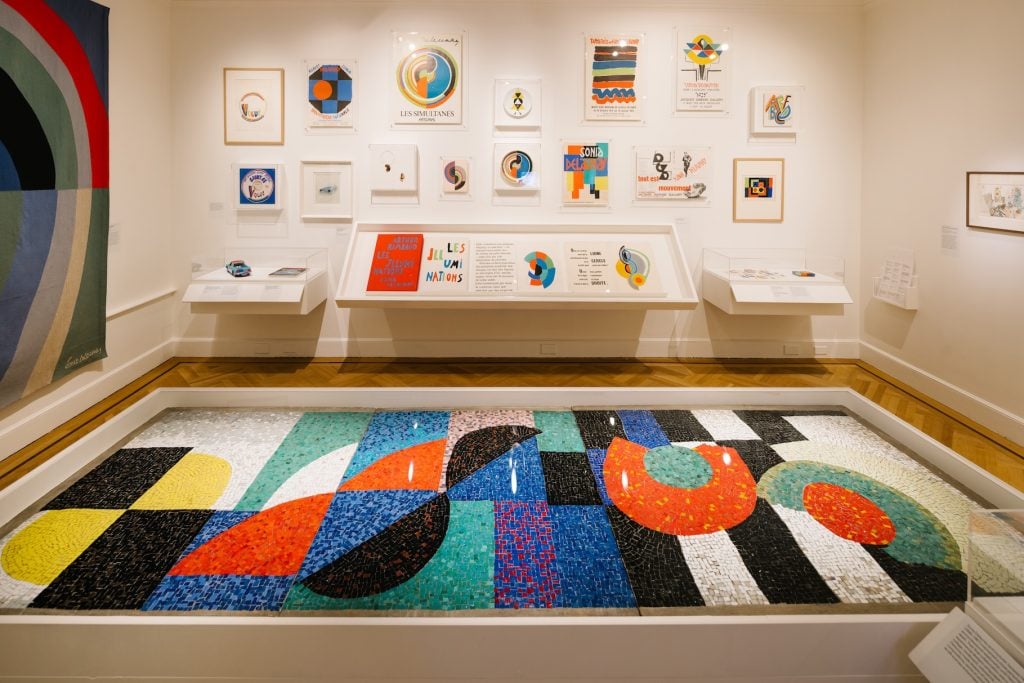 A colorful geometric mosaic by Sonia Delaunay, on view with works on paper by the artist in "Sonia Delaunay: Living Art" at the Bard Graduate Center Gallery. 