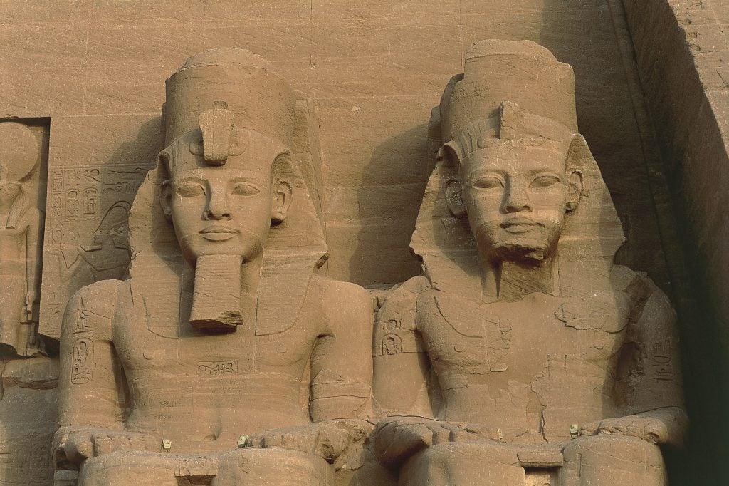 Two colossal stone statues on the Temple of Ramses II