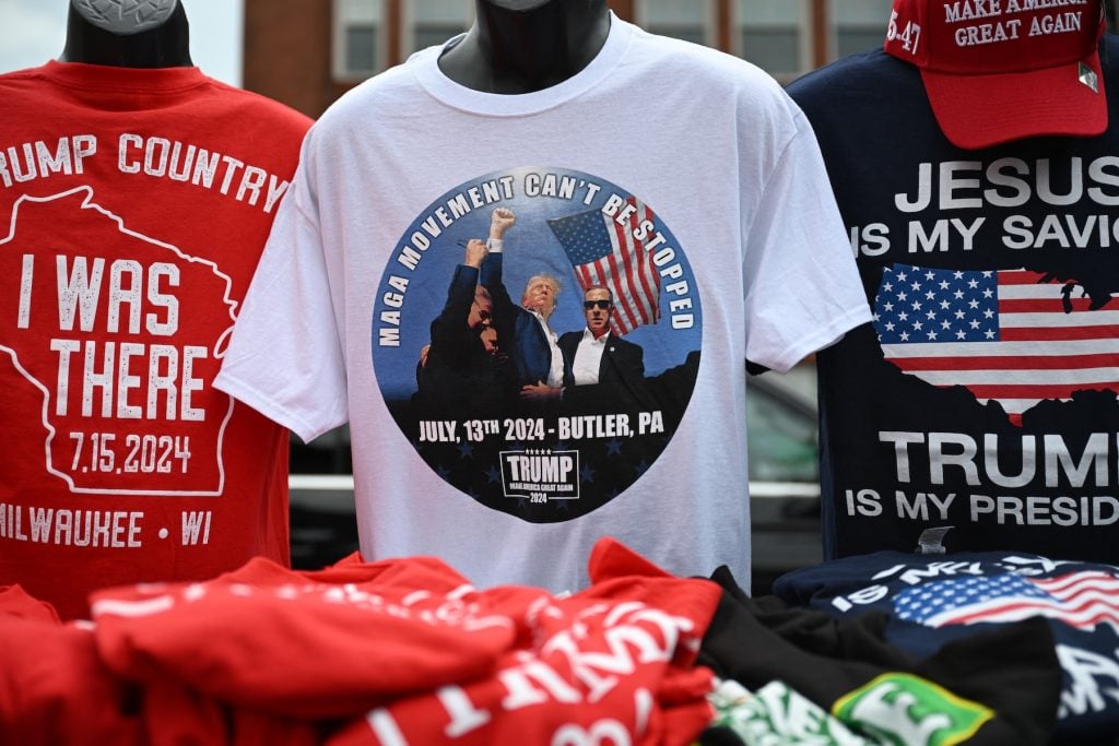 A T-shirt with a picture of a man with a bloodied face and upraised fist