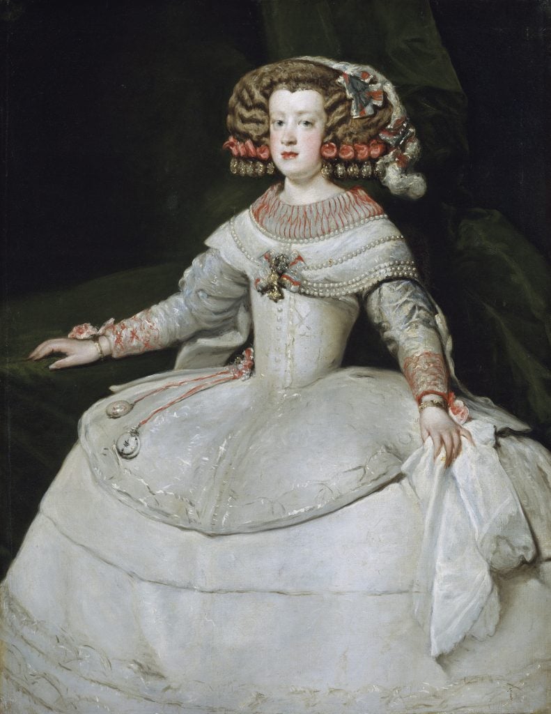 Velázquez's portrait of Infanta Maria Theresa features her in elaborate attire