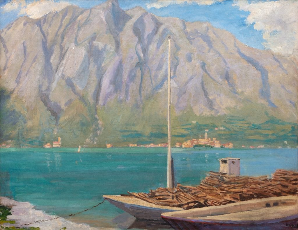 Painted landscape of a harbor with a wooden barge loaded with chopped wood in the foreground and on the opposite side a large, craggy mountain.