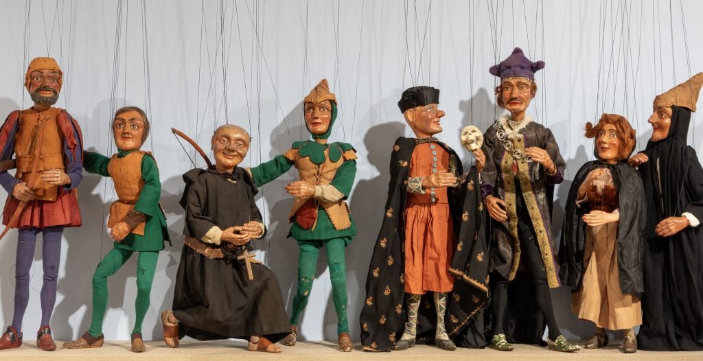 a row of puppets comprising the cast used for Tony Sarg's Robin Hood