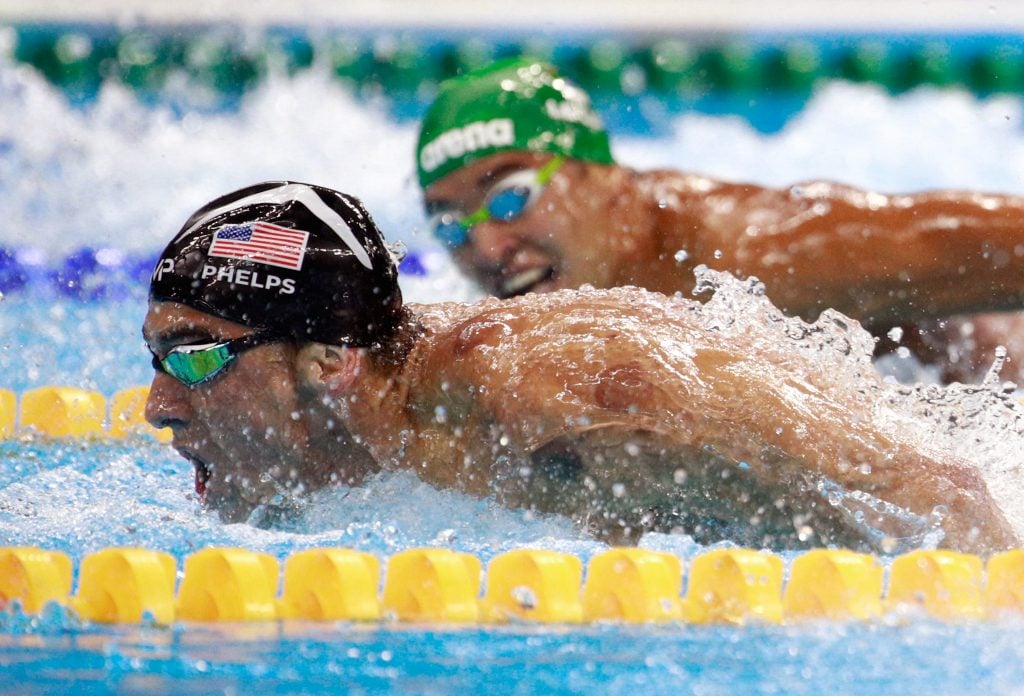 A close up shot of Michael Phelps of the United States leading Chad le Clos of South Africa in the Men's 200m Butterfly Final at the Rio 2016 Olympic Games