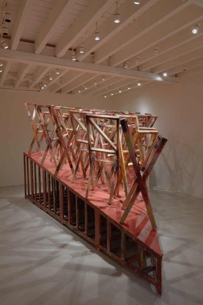 This image shows an installation in complex wooden structure