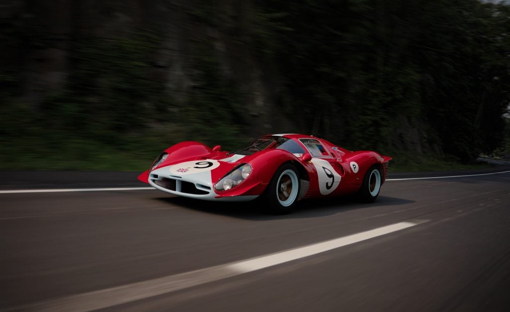 an image of a red Ferrari on a racing track