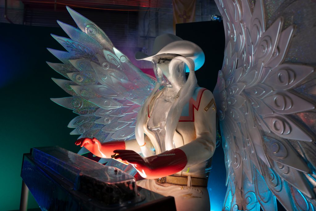 An angel musician figure in Cowboix Hevvven, the bar and restaurant installation coming to Meow Wolf Houston.