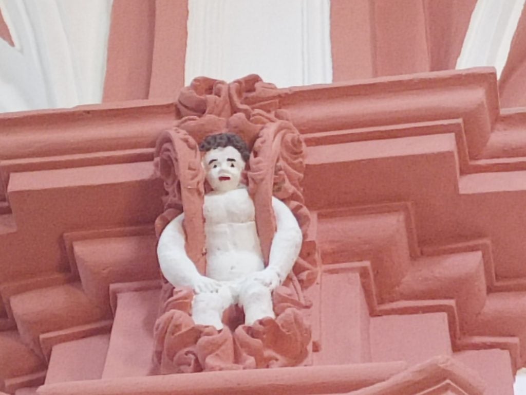 A ridiculous restoration led to these absurdly cartoonish cherubs at Ermita de Nuestra Señora del Mirón church in Soria, Spain. Photo courtesy of Soria Patrimonio.