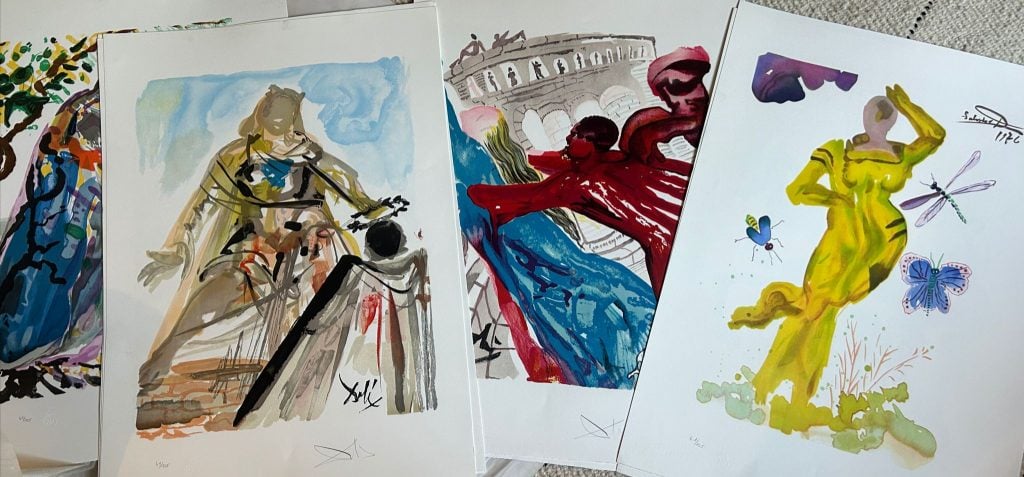 a group of brightly colored Dali lithographs