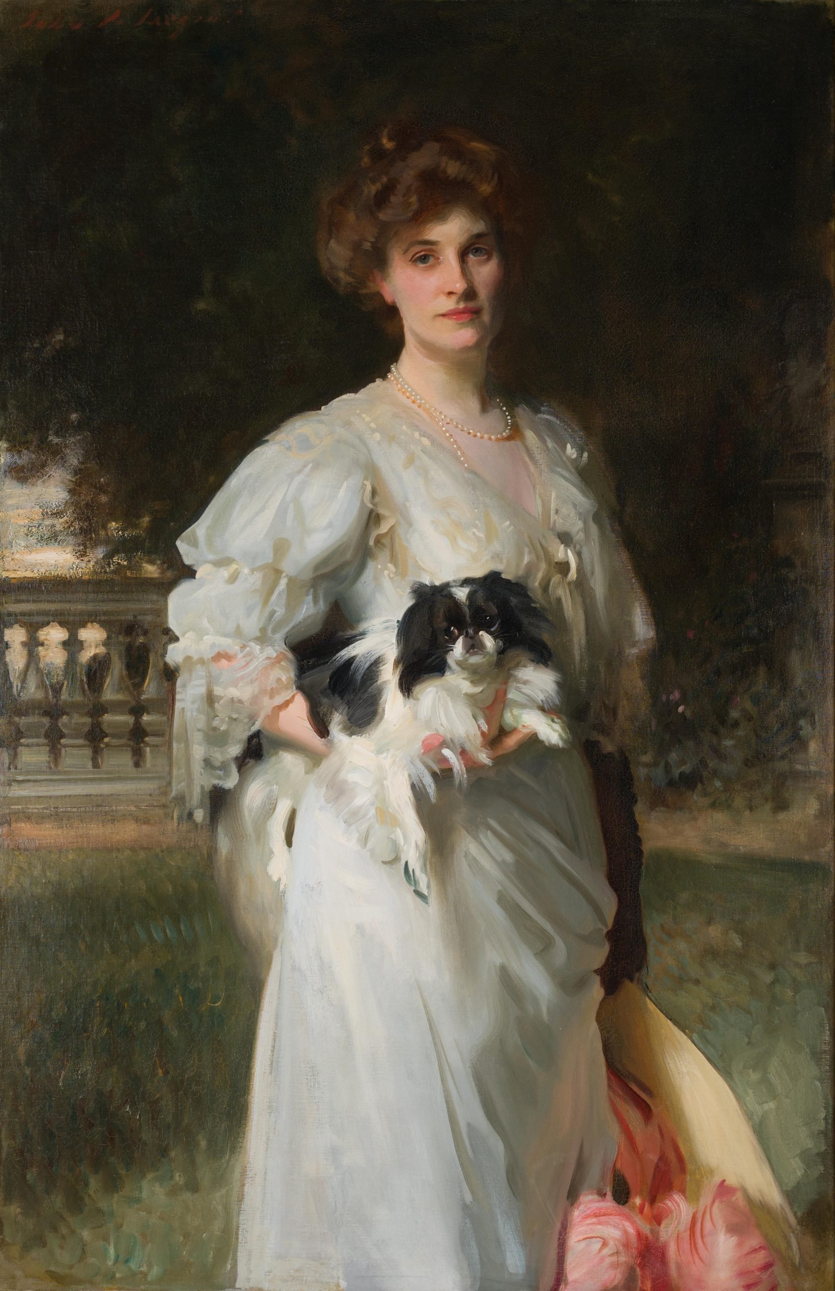 portrait of a woman in formal dress holding a small dog