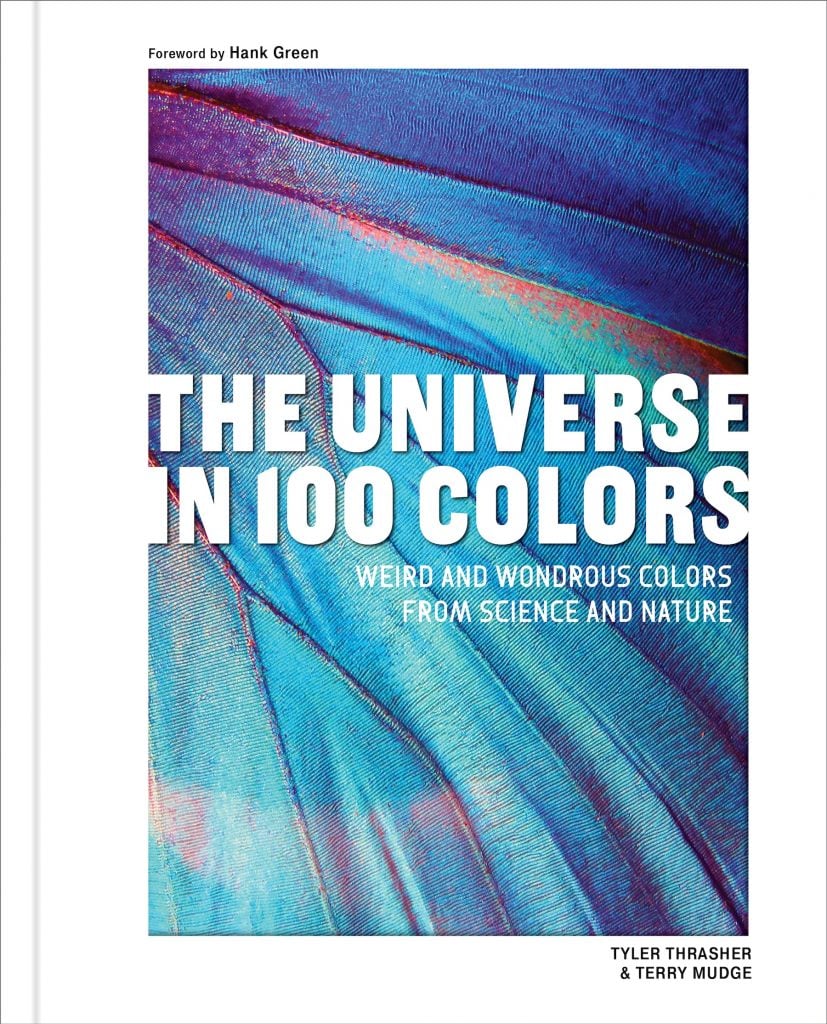 A book cover with the words “The Universe in 100 Colors: Strange and Wondrous Colors from Science and Nature”