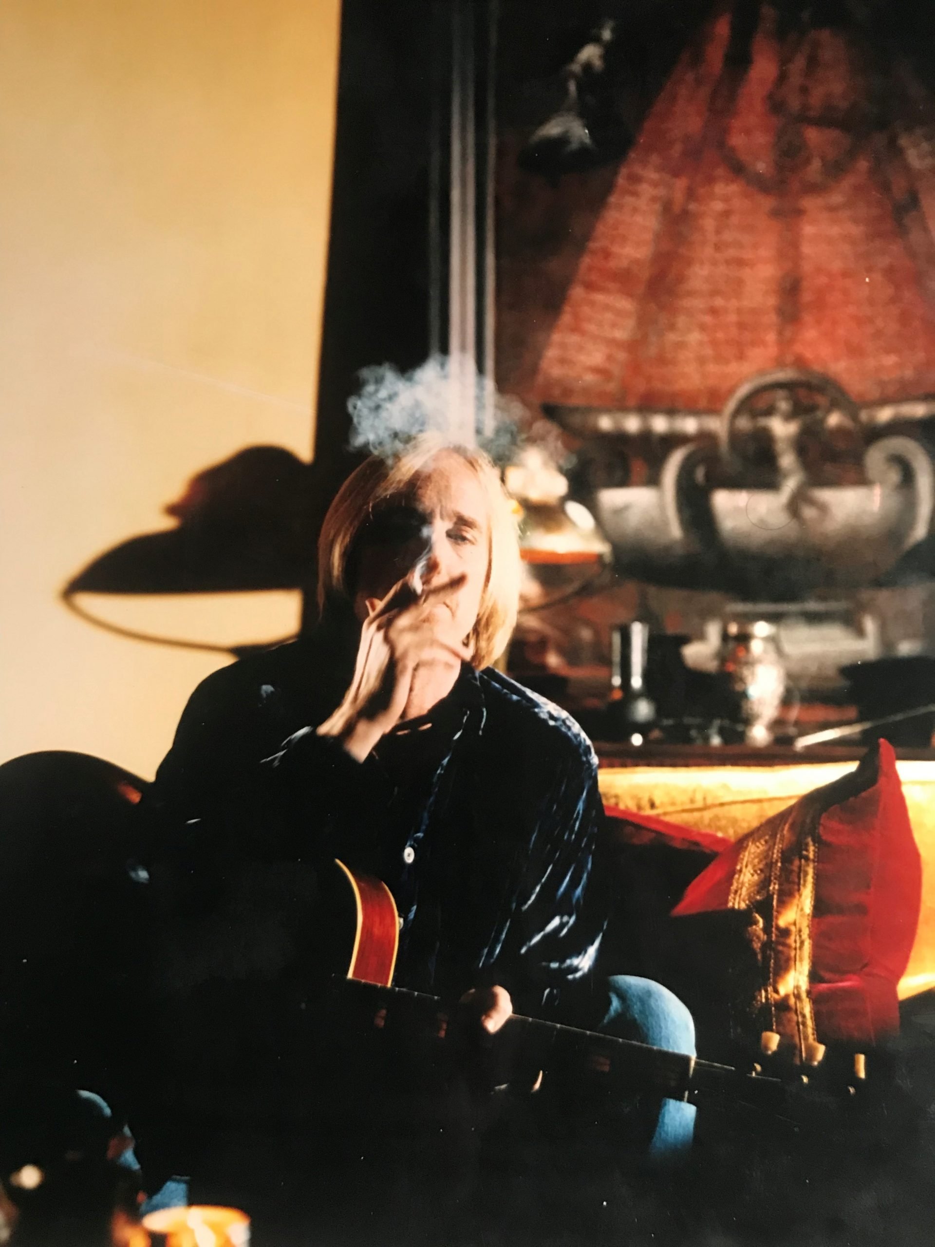 photograph of a blond man smoking