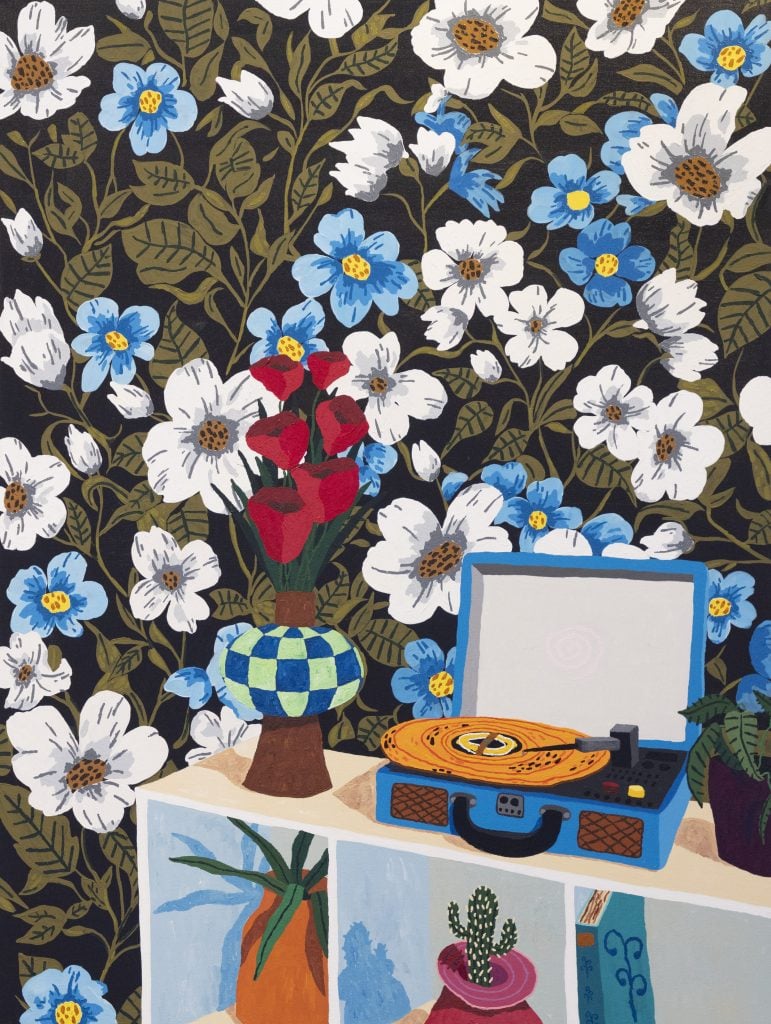 A Contemporary Intimist painting by american artist Cooper, featuring a bold and graphic wallpaper pattern of florals and vines behind a shelving unit with a record player on top, a vase of red flowers, and various other small plants.